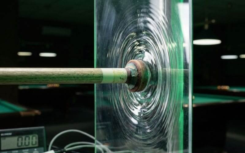 Impact-resistant outdoor TV enclosure screen demonstrating strong shock protection for bars and restaurants