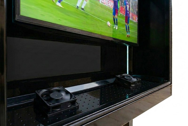 Close-up of active cooling fans on an outdoor TV enclosure for heat management